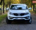 Білий Кіа Sportage, об'ємом двигуна 2 л та пробігом 198 тис. км за 12900 $, фото 4 на Automoto.ua