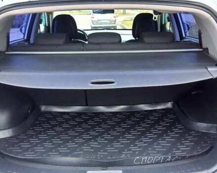 Білий Кіа Sportage, об'ємом двигуна 2 л та пробігом 102 тис. км за 14700 $, фото 28 на Automoto.ua