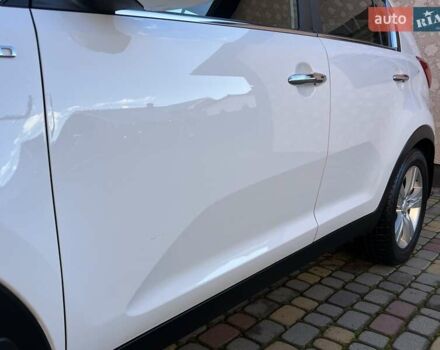 Білий Кіа Sportage, об'ємом двигуна 2 л та пробігом 223 тис. км за 14950 $, фото 60 на Automoto.ua