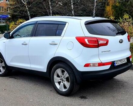 Білий Кіа Sportage, об'ємом двигуна 2 л та пробігом 102 тис. км за 14700 $, фото 7 на Automoto.ua