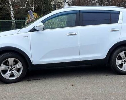 Білий Кіа Sportage, об'ємом двигуна 2 л та пробігом 102 тис. км за 14700 $, фото 2 на Automoto.ua