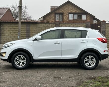 Білий Кіа Sportage, об'ємом двигуна 2 л та пробігом 121 тис. км за 12300 $, фото 5 на Automoto.ua