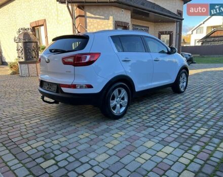 Білий Кіа Sportage, об'ємом двигуна 2 л та пробігом 223 тис. км за 14950 $, фото 68 на Automoto.ua