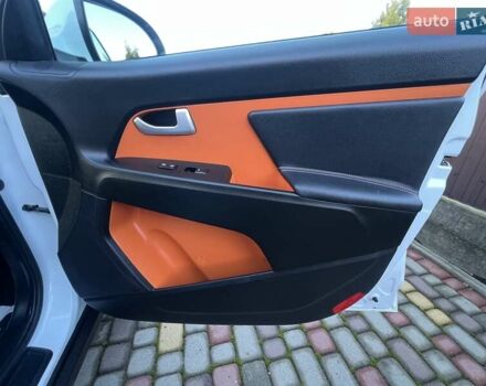 Білий Кіа Sportage, об'ємом двигуна 2 л та пробігом 223 тис. км за 14950 $, фото 111 на Automoto.ua