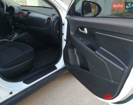 Білий Кіа Sportage, об'ємом двигуна 2 л та пробігом 198 тис. км за 12900 $, фото 5 на Automoto.ua