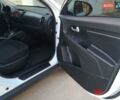 Білий Кіа Sportage, об'ємом двигуна 2 л та пробігом 198 тис. км за 12900 $, фото 5 на Automoto.ua