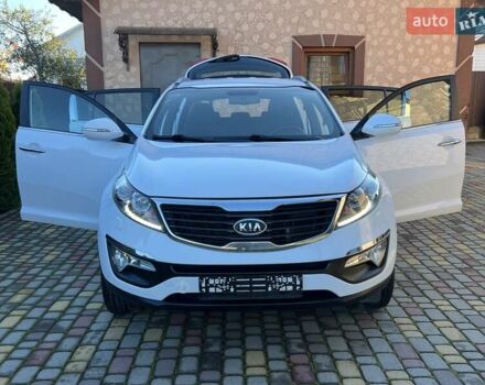 Білий Кіа Sportage, об'ємом двигуна 2 л та пробігом 223 тис. км за 14950 $, фото 69 на Automoto.ua