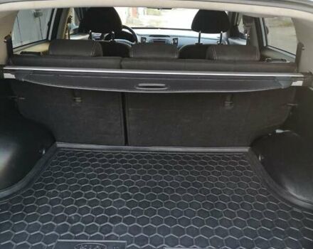 Білий Кіа Sportage, об'ємом двигуна 2 л та пробігом 198 тис. км за 12900 $, фото 16 на Automoto.ua