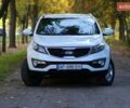 Білий Кіа Sportage, об'ємом двигуна 2 л та пробігом 198 тис. км за 12900 $, фото 1 на Automoto.ua