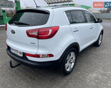 Білий Кіа Sportage, об'ємом двигуна 2 л та пробігом 234 тис. км за 13950 $, фото 4 на Automoto.ua