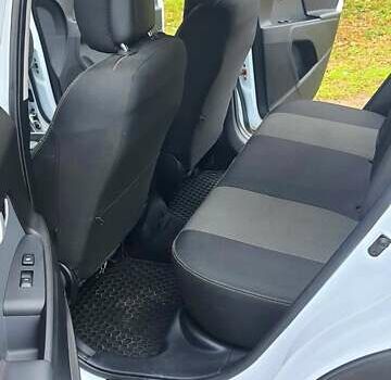 Білий Кіа Sportage, об'ємом двигуна 2 л та пробігом 102 тис. км за 14700 $, фото 21 на Automoto.ua