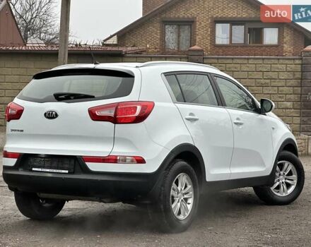 Білий Кіа Sportage, об'ємом двигуна 2 л та пробігом 158 тис. км за 12300 $, фото 14 на Automoto.ua