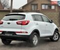 Білий Кіа Sportage, об'ємом двигуна 2 л та пробігом 158 тис. км за 12300 $, фото 14 на Automoto.ua
