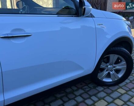 Білий Кіа Sportage, об'ємом двигуна 2 л та пробігом 223 тис. км за 14950 $, фото 64 на Automoto.ua