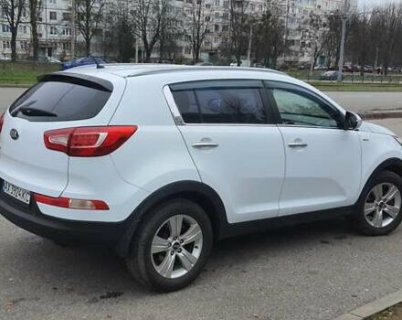 Білий Кіа Sportage, об'ємом двигуна 2 л та пробігом 102 тис. км за 14700 $, фото 13 на Automoto.ua