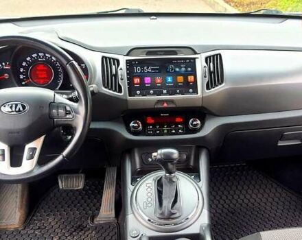 Білий Кіа Sportage, об'ємом двигуна 2 л та пробігом 102 тис. км за 14700 $, фото 22 на Automoto.ua
