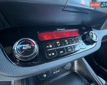 Білий Кіа Sportage, об'ємом двигуна 2 л та пробігом 223 тис. км за 14950 $, фото 85 на Automoto.ua