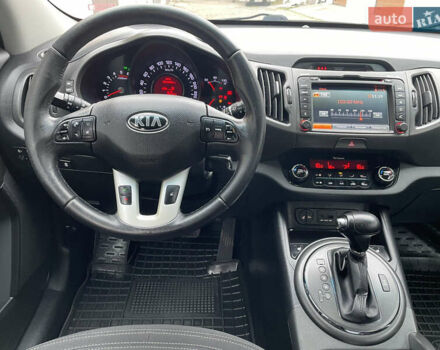Білий Кіа Sportage, об'ємом двигуна 2 л та пробігом 234 тис. км за 13950 $, фото 10 на Automoto.ua