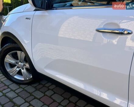 Білий Кіа Sportage, об'ємом двигуна 2 л та пробігом 223 тис. км за 14950 $, фото 61 на Automoto.ua
