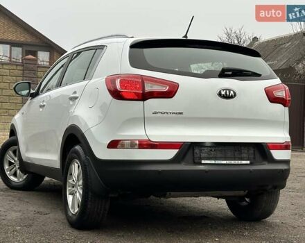 Білий Кіа Sportage, об'ємом двигуна 2 л та пробігом 158 тис. км за 12300 $, фото 10 на Automoto.ua
