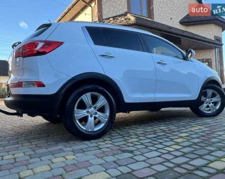 Білий Кіа Sportage, об'ємом двигуна 2 л та пробігом 223 тис. км за 14950 $, фото 54 на Automoto.ua