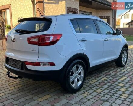 Білий Кіа Sportage, об'ємом двигуна 2 л та пробігом 223 тис. км за 14950 $, фото 6 на Automoto.ua