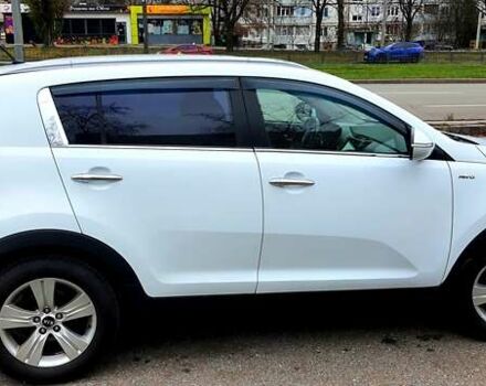Білий Кіа Sportage, об'ємом двигуна 2 л та пробігом 102 тис. км за 14700 $, фото 15 на Automoto.ua