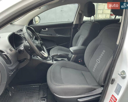 Білий Кіа Sportage, об'ємом двигуна 2 л та пробігом 234 тис. км за 13950 $, фото 23 на Automoto.ua