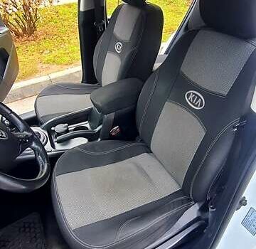 Білий Кіа Sportage, об'ємом двигуна 2 л та пробігом 102 тис. км за 14700 $, фото 18 на Automoto.ua
