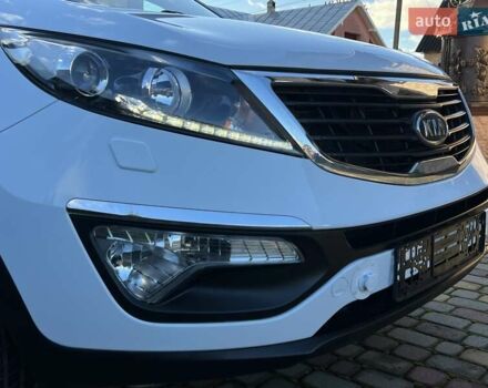 Білий Кіа Sportage, об'ємом двигуна 2 л та пробігом 223 тис. км за 14950 $, фото 28 на Automoto.ua
