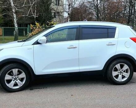 Білий Кіа Sportage, об'ємом двигуна 2 л та пробігом 102 тис. км за 14700 $, фото 3 на Automoto.ua
