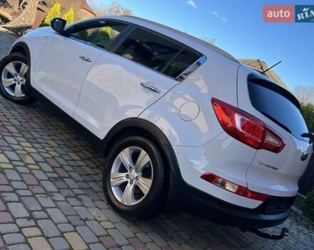 Білий Кіа Sportage, об'ємом двигуна 2 л та пробігом 223 тис. км за 14950 $, фото 52 на Automoto.ua