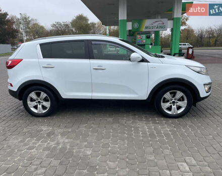 Білий Кіа Sportage, об'ємом двигуна 2 л та пробігом 234 тис. км за 13950 $, фото 3 на Automoto.ua