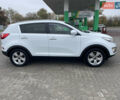 Білий Кіа Sportage, об'ємом двигуна 2 л та пробігом 234 тис. км за 13950 $, фото 3 на Automoto.ua