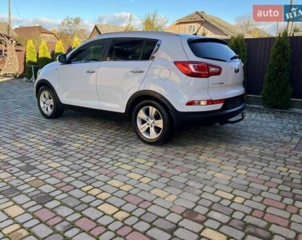 Білий Кіа Sportage, об'ємом двигуна 2 л та пробігом 223 тис. км за 14950 $, фото 65 на Automoto.ua