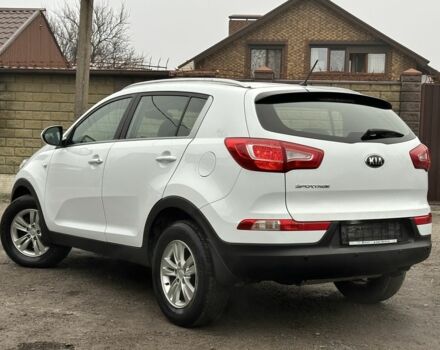 Білий Кіа Sportage, об'ємом двигуна 2 л та пробігом 121 тис. км за 12300 $, фото 6 на Automoto.ua