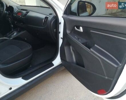 Білий Кіа Sportage, об'ємом двигуна 2 л та пробігом 198 тис. км за 12900 $, фото 18 на Automoto.ua