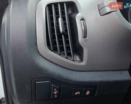 Білий Кіа Sportage, об'ємом двигуна 1.69 л та пробігом 230 тис. км за 14440 $, фото 55 на Automoto.ua