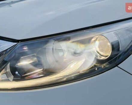 Білий Кіа Sportage, об'ємом двигуна 2 л та пробігом 211 тис. км за 15300 $, фото 14 на Automoto.ua