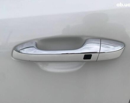 Білий Кіа Sportage, об'ємом двигуна 2 л та пробігом 193 тис. км за 19290 $, фото 3 на Automoto.ua