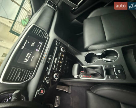 Білий Кіа Sportage, об'ємом двигуна 2 л та пробігом 94 тис. км за 24300 $, фото 15 на Automoto.ua