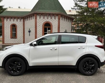 Білий Кіа Sportage, об'ємом двигуна 2 л та пробігом 103 тис. км за 23500 $, фото 4 на Automoto.ua
