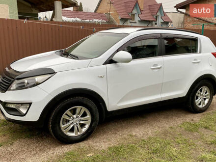 Белый Киа Sportage, объемом двигателя 2 л и пробегом 244 тыс. км за 9990 $, фото 1 на Automoto.ua