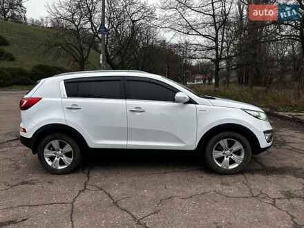 Білий Кіа Sportage, об'ємом двигуна 2 л та пробігом 179 тис. км за 13000 $, фото 1 на Automoto.ua