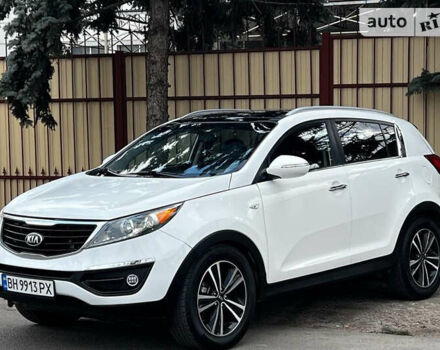 Белый Киа Sportage, объемом двигателя 2 л и пробегом 100 тыс. км за 14200 $, фото 1 на Automoto.ua