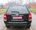 Черный Киа Sportage, объемом двигателя 2 л и пробегом 213 тыс. км за 7700 $, фото 4 на Automoto.ua