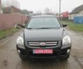 Черный Киа Sportage, объемом двигателя 2 л и пробегом 213 тыс. км за 7700 $, фото 1 на Automoto.ua