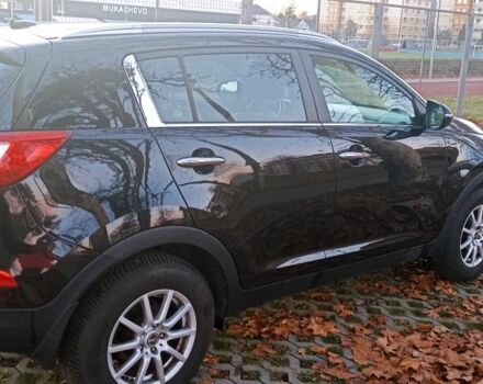 Чорний Кіа Sportage, об'ємом двигуна 2 л та пробігом 256 тис. км за 13350 $, фото 2 на Automoto.ua