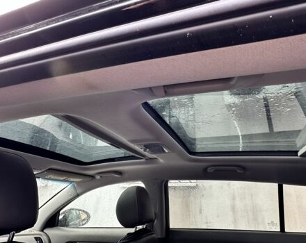 Черный Киа Sportage, объемом двигателя 2.4 л и пробегом 114 тыс. км за 12000 $, фото 4 на Automoto.ua