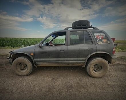 Черный Киа Sportage, объемом двигателя 2 л и пробегом 240 тыс. км за 2000 $, фото 3 на Automoto.ua